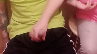 a woman jerks off my cock close up